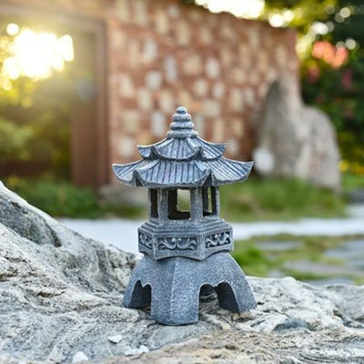 lampe solaire de jardin decorative sur pierre