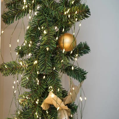 Guirlande lumineuse exterieur 100m dans sapin de noel
