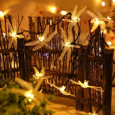 guirlande solaire libellule sur mini cloture