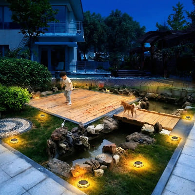 lampe solaire sol exterieur illumine jardin