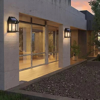 Luminaire extérieur en duo sur mur de maison